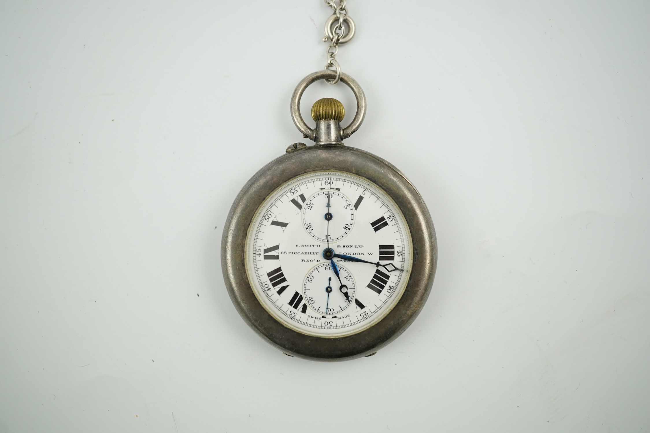 A George V silver open farce keyless pocket watch, by S. Smith & Son, with two subsidiary dials, case diameter 45mm, with a sterling chain. Condition - poor